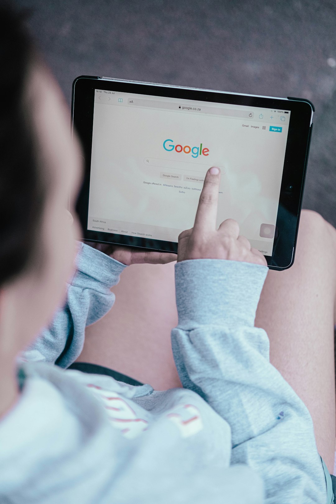 Girl searching on ipad